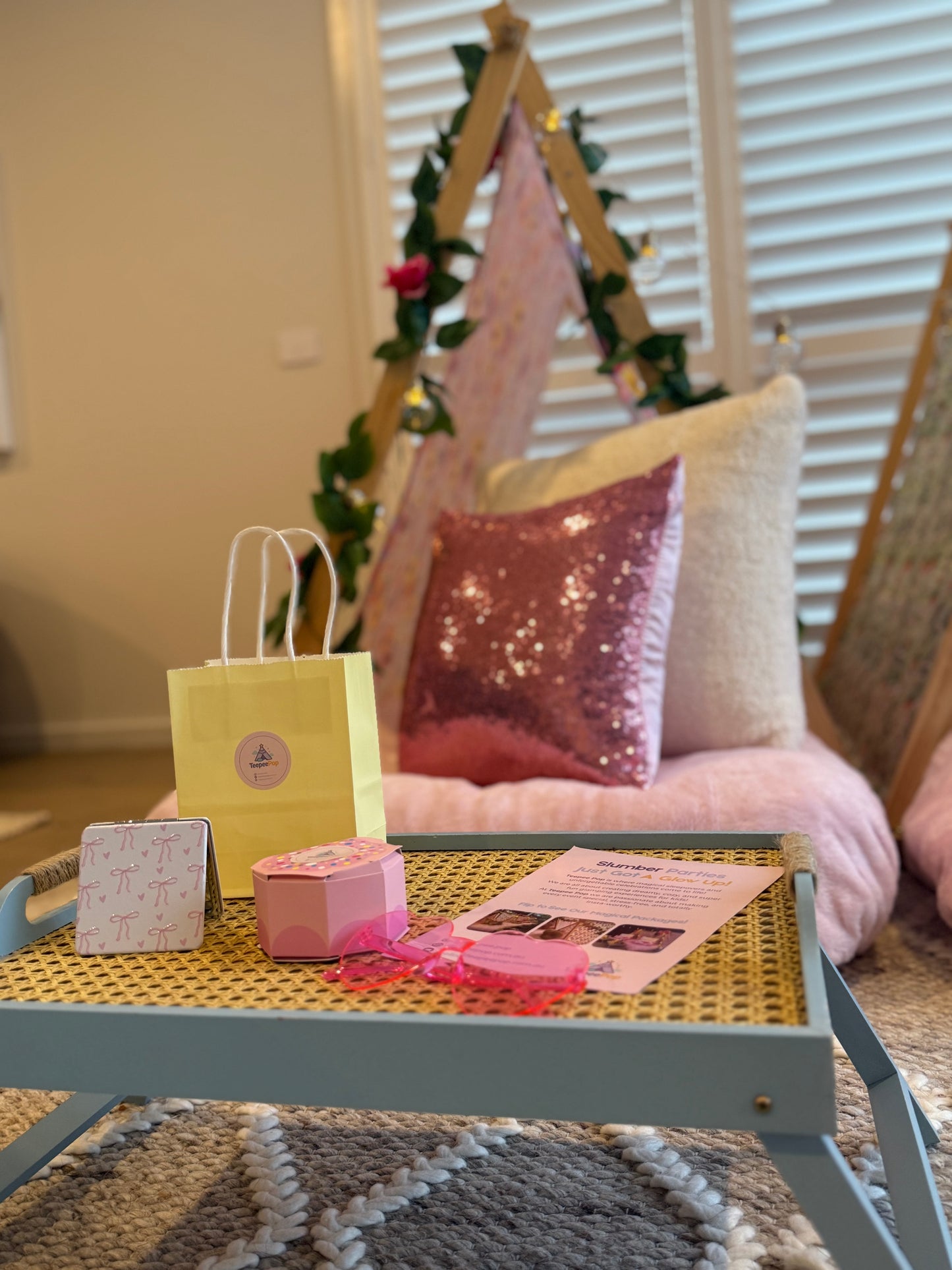Flamingo-themed teepee setup with pink tents, pink bedding, and flamingo cushions for a cute ultimate girls’ sleepover