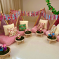 Four (4) pink cute teepees with bunting and pink blanket set up for a luxury indoor slumber party in Melbourne