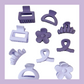 Kids Small Assorted clips in colour purple. Designs include cute flower, swirls, etc.