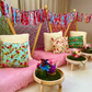 Boho teepee sleepover setup with fairy lights, pink tones, and decorative pillows for a girl's sleepover party in Melbourne, Australia.