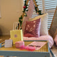 Flamingo-themed teepee setup with pink tents, pink bedding, and flamingo cushions for a cute ultimate girls’ sleepover