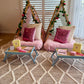 Flamingo-themed teepee setup with pink tents, pink bedding, and flamingo cushions for a cute ultimate girls’ sleepover